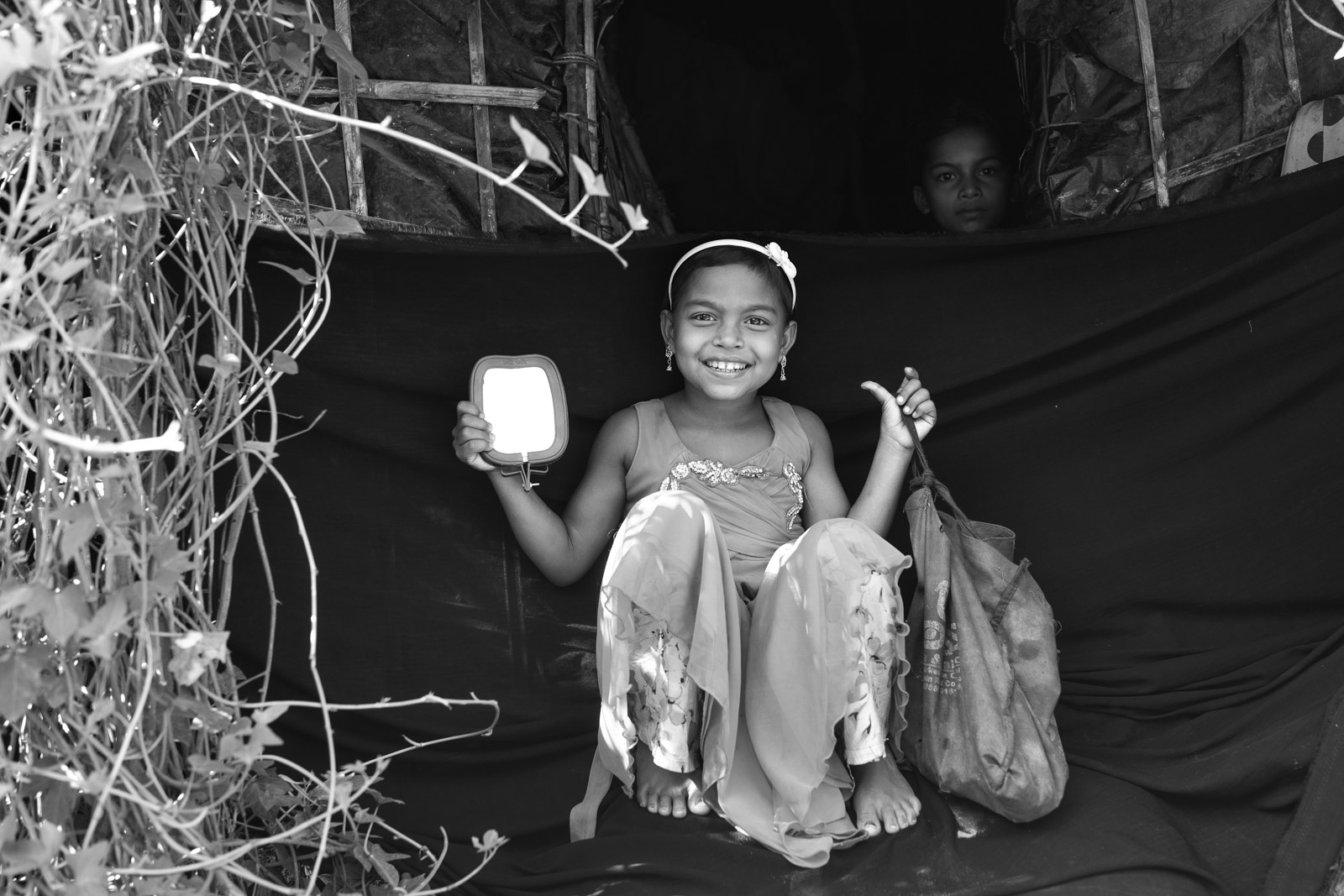 Little girl smiling grayscale
