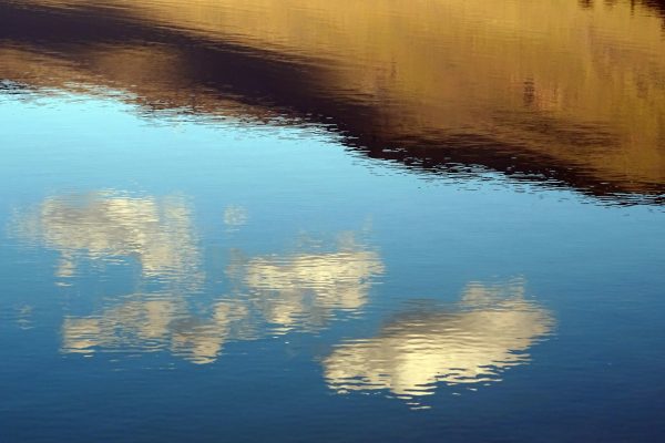 Reflection of the sky and clouds