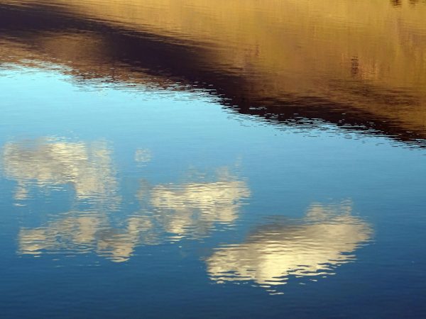 Reflection of the sky and clouds